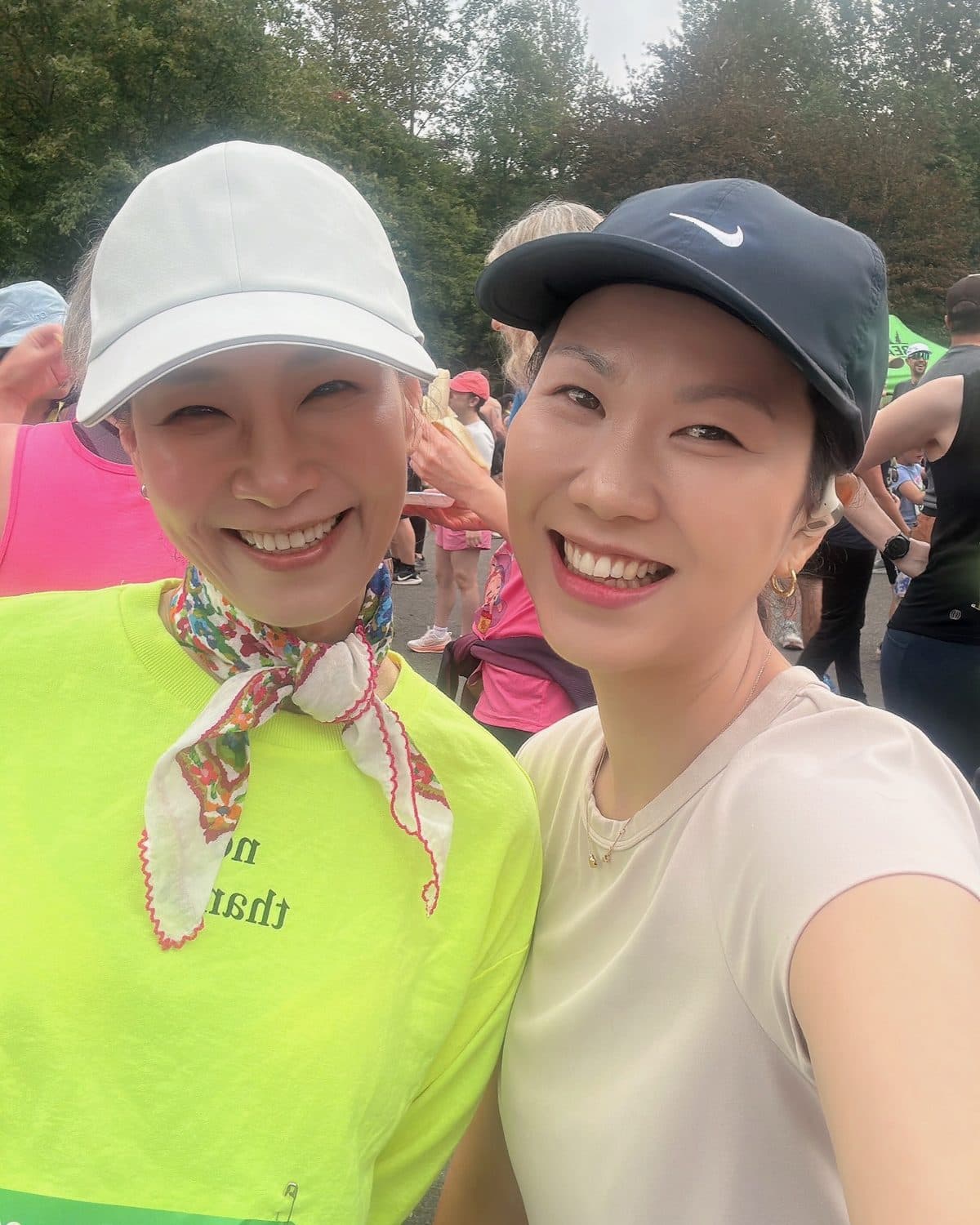 Esther Koh and Julie Kim, co-directors of PTL Treehouse, at a community charity run